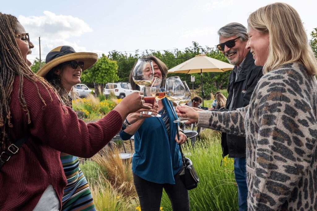 Group toasting with wine